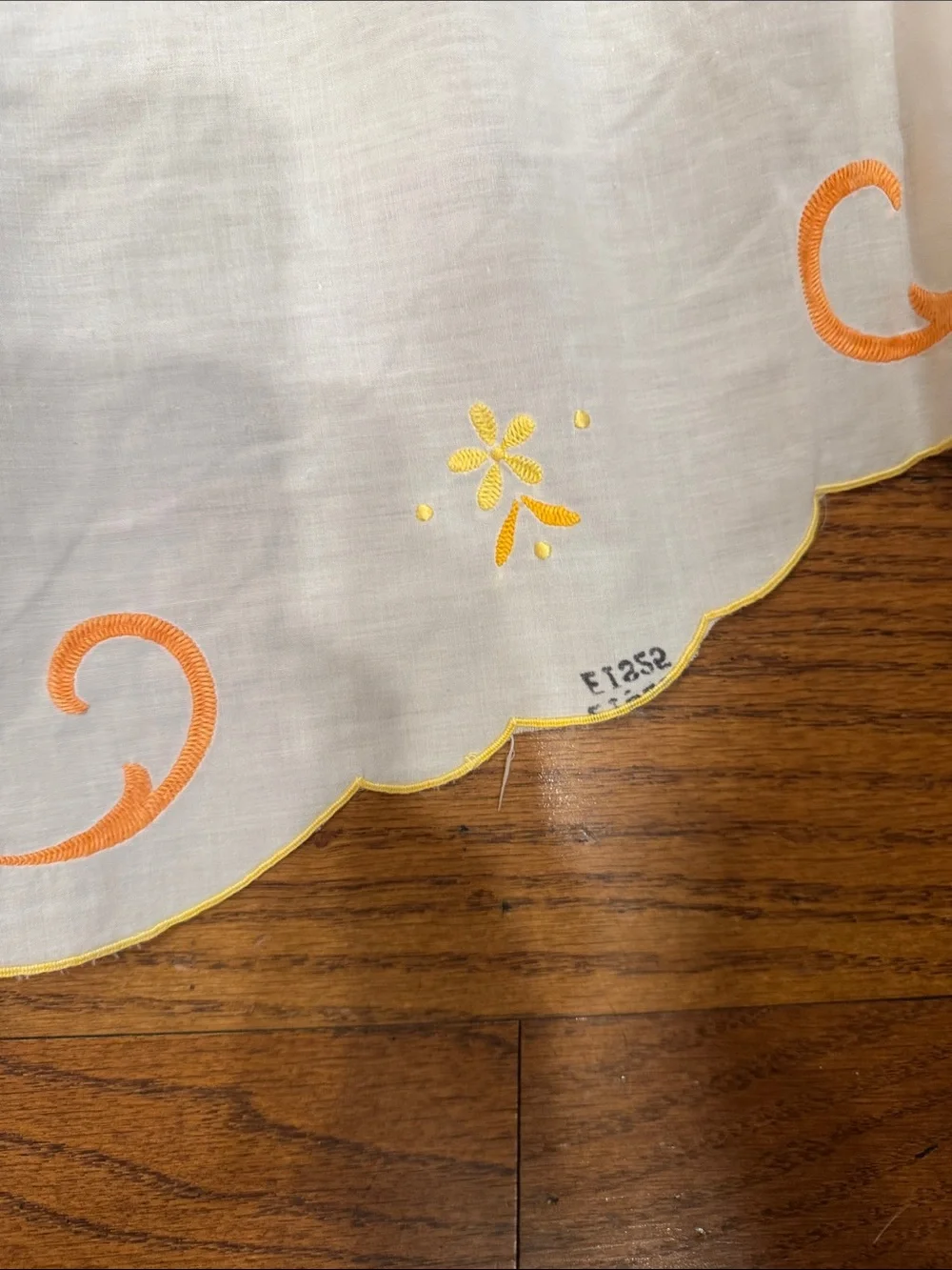 White vintage Tablecloth W/ Orange & Yellow Floral  Design. Size 114x64
